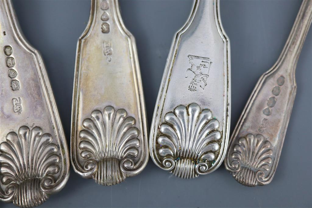 A part canteen of William IV silver double struck fiddle, thread and shell pattern flatware by William Eaton,